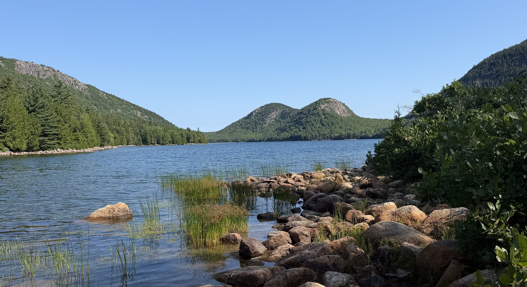Quiet Acadia lake and mountain view photographed by Mushtaq